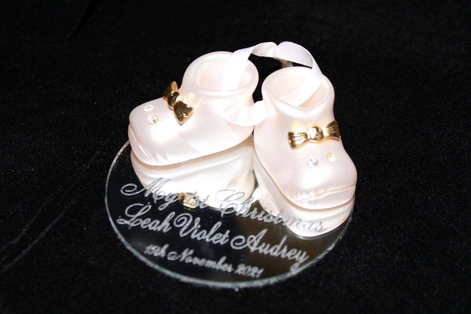 Personalised Baby Boots Ornament On Mirror Base